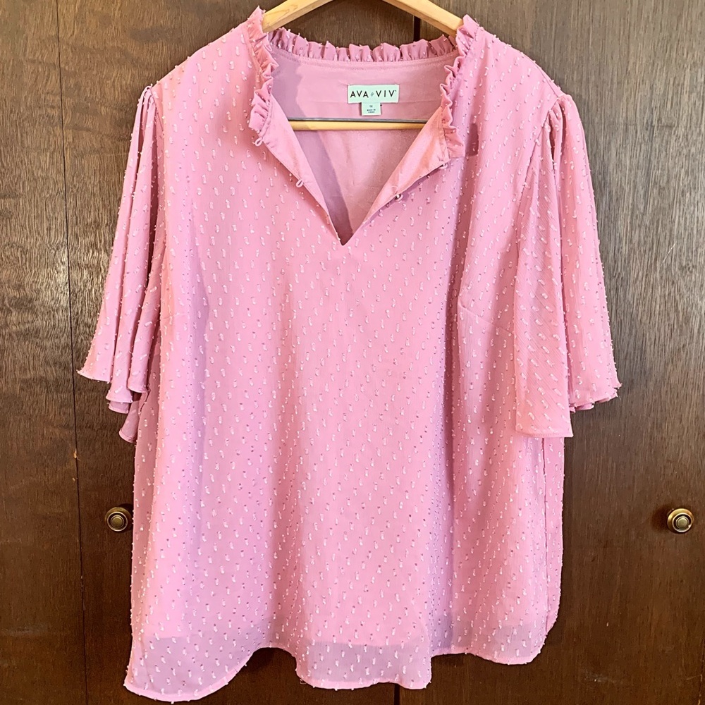 Blush pink blouse.